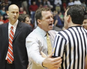 Coach Gottfried states his case to a ref during Sunday night's loss to Mercer.  "Dude, if you think Saban's not gonna have those guys ready to beat Auburn, you're crazy!!!"